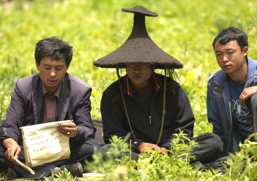 Shaman During A Ceremony, Lugu Lake, Yunnan Province, China