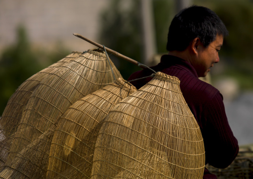 Woman With A Fishing Nets On His Back, Shaxi, Yunnan Province, China