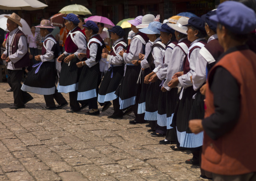 Naxi Minority Women Dancing, Lijiang, Yunnan Province, China