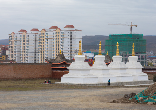 Stupas in front of the modern town in Hezuo monastery, Gansu province, Hezuo, China