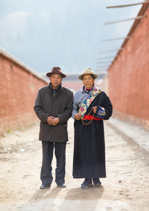 Tibetan couple in Labrang monastery street, Gansu province, Labrang, China