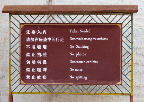 Warning sign outside a temple in Labrang monastery, Gansu province, Labrang, China