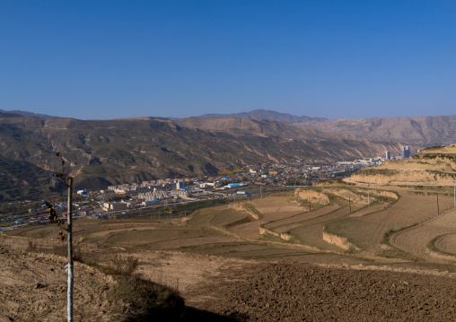 View of rebkong town in the valley from the mountain, Tongren County, Rebkong, China