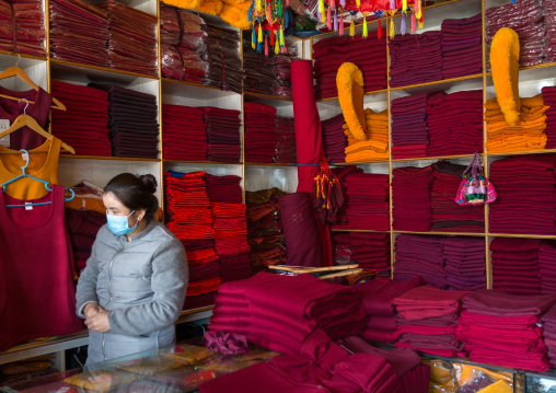 Tibetan shop selling robes and hats for the monks near Rongwo monastery, Tongren County, Longwu, China