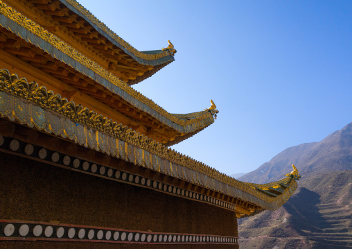 Temple roof in Bongya monastery, Qinghai province, Mosele, China