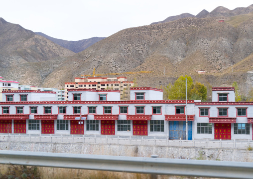 New empty apartments waiting a wave of Han chinese migrants, Gansu province, Labrang, China