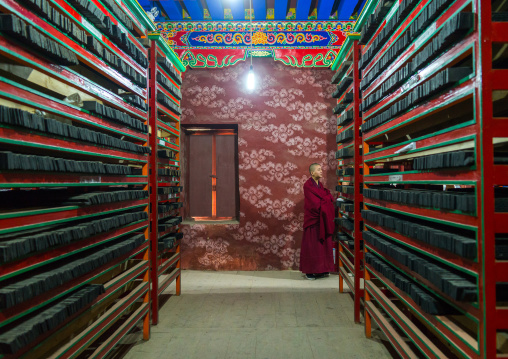 Tibetan scriptures printed from wooden blocks in Barkhang library, Gansu province, Labrang, China