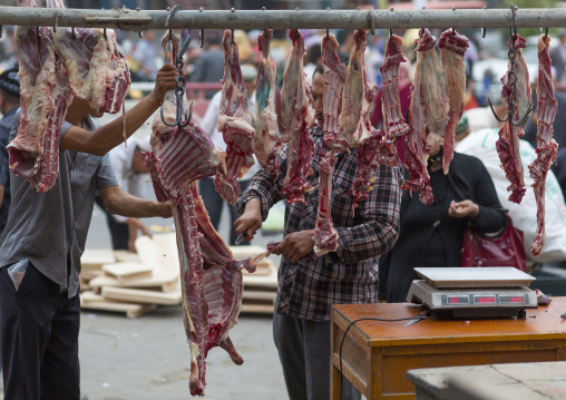 Butcher Cutting Meat For Customers, Hotan, Xinjiang Uyghur Autonomous Region, China