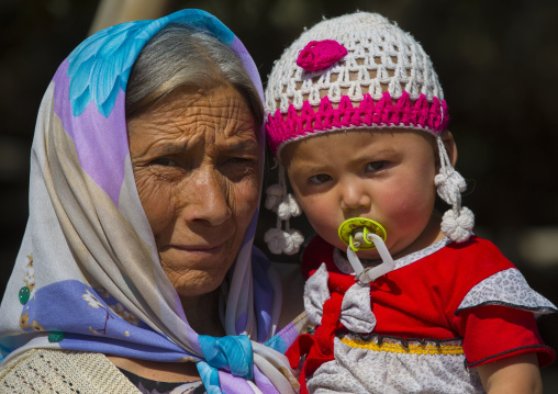 Uyghur Old Woman And Baby, Yecheng, Xinjiang Uyghur Autonomous Region, China