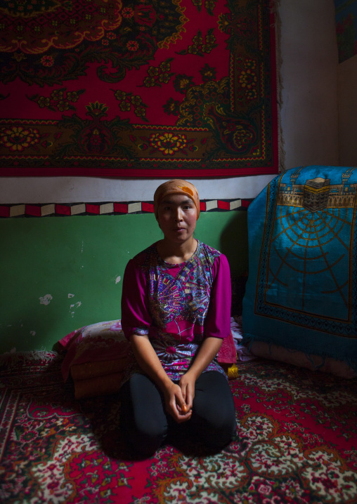 Uyghur Woman In Her Home, Keriya, Xinjiang Uyghur Autonomous Region, China