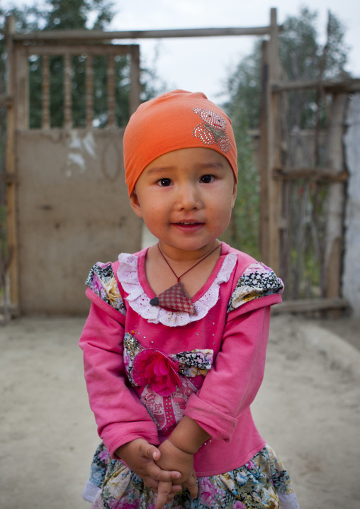 Young Uyghur Girl, Minfeng, Xinjiang Uyghur Autonomous Region, China