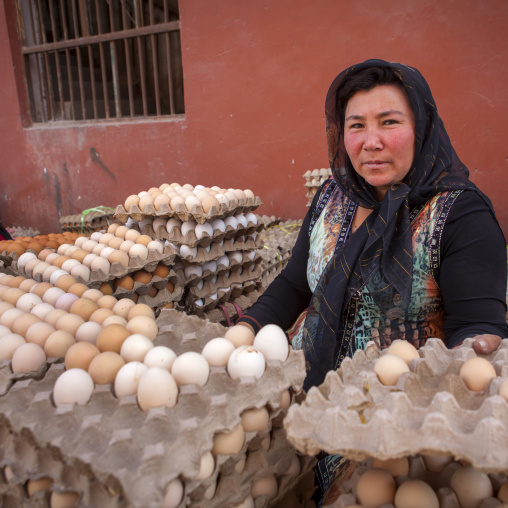 Uyghur Woman Selling Eggs, Serik Buya Market, Yarkand, Xinjiang Uyghur Autonomous Region, China
