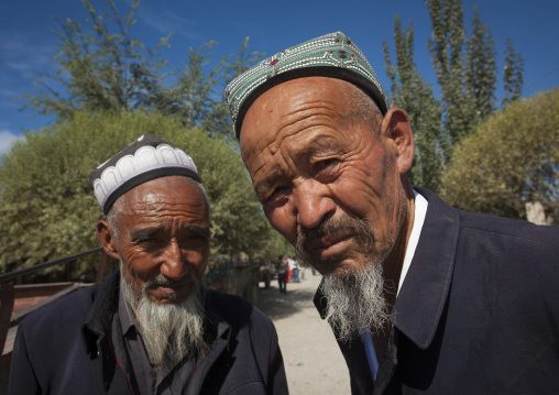 Old Uyghur Men In Serik Buya Market, Yarkand, Xinjiang Uyghur Autonomous Region, China