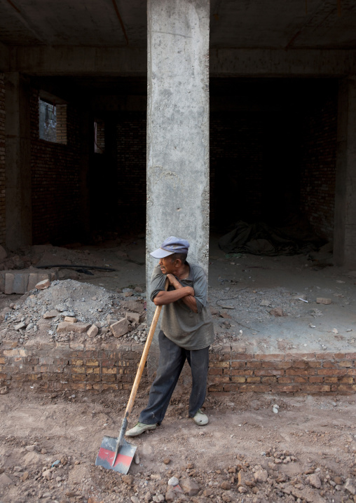 Worker On A Construction Site in the old town, Kashgar, Xinjiang Uyghur Autonomous Region, China