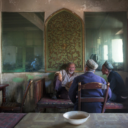 Uyghur Men In Ostangboyi Tea House, Kashgar, Xinjiang Uyghur Autonomous Region, China