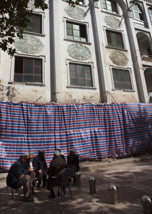 Old Uyghur Men Chatting In Front Of An Old Building, Kashgar, Xinjiang Uyghur Autonomous Region, China