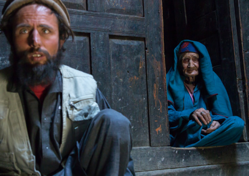 Afghan man with his old mother in a pamiri house, Badakhshan province, Qazi deh, Afghanistan