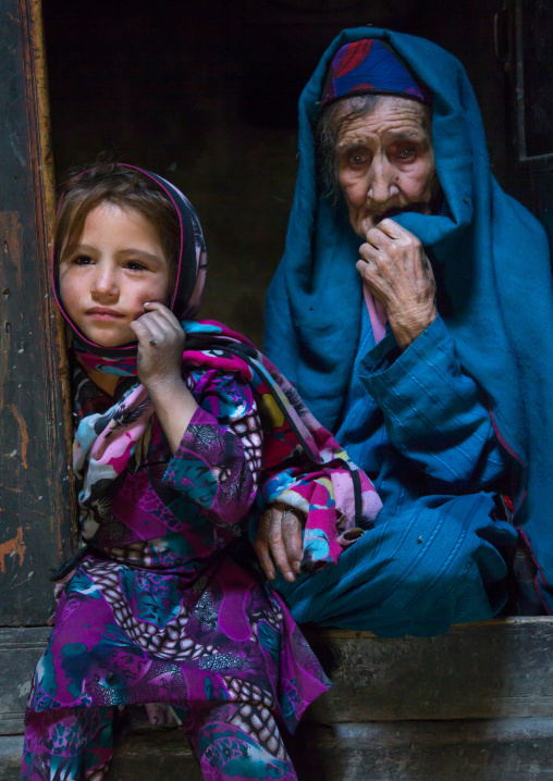 Portrait of an afghan girl with her grand mother in a pamiri house, Badakhshan province, Qazi deh, Afghanistan