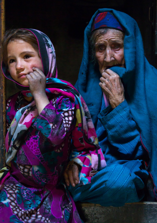 Portrait of an afghan girl with her grand mother in a pamiri house, Badakhshan province, Qazi deh, Afghanistan