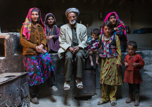 Afghan family inside their traditional pamiri house, Badakhshan province, Wuzed, Afghanistan