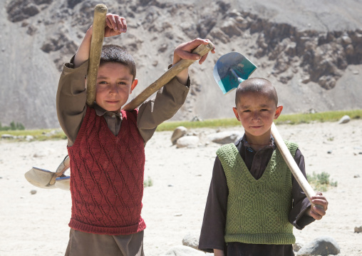 Afghan boys working on a road, Badakhshan province, Khandood, Afghanistan