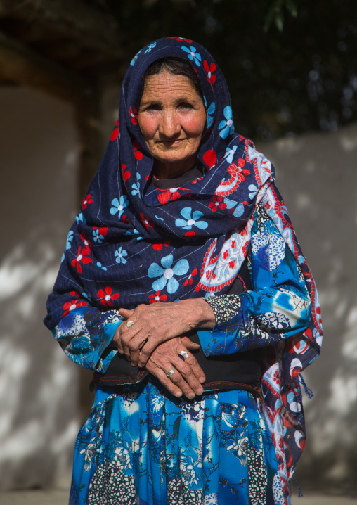 Afghan woman in her traditional pamiri house courtyard, Badakhshan province, Qazi deh, Afghanistan