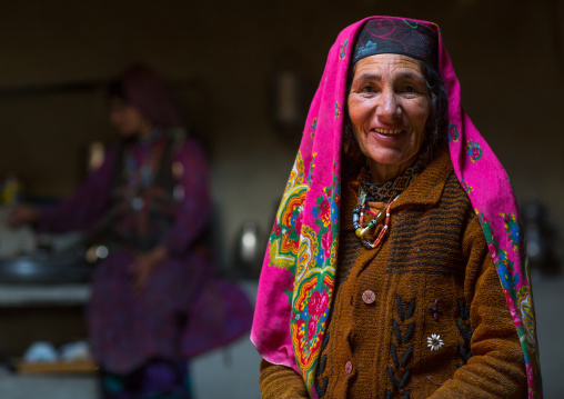 Portrait of an afghan woman in pamiri traditional clothing, Badakhshan province, Wuzed, Afghanistan