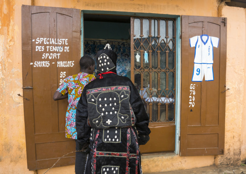 Benin, West Africa, Porto-Novo, egoun egoun spirit of the deads asks money to a taylor in exchange of blessings