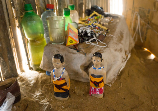 Benin, West Africa, Ouidah, carved wooden figures made to house the soul of dead twins inside a house