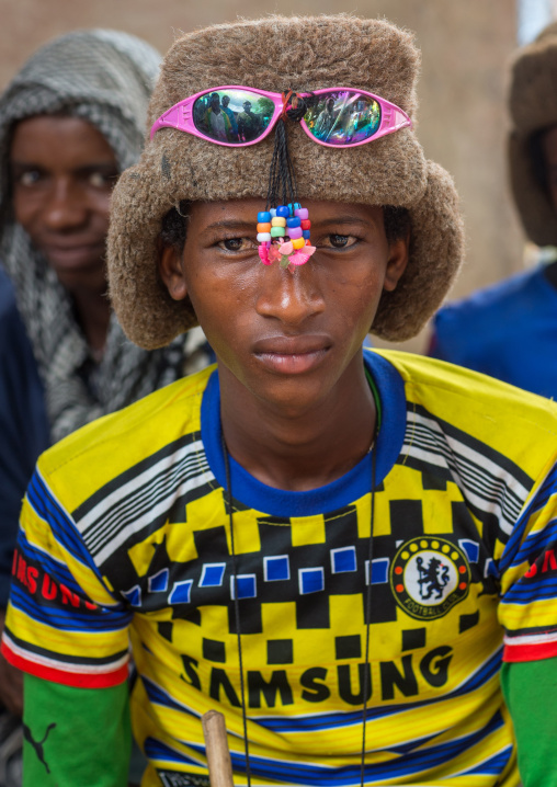 Benin, West Africa, Copargo, young fulani peul tribe man with colorful and fashionable clothes