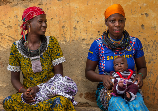 Benin, West Africa, Copargo, beautiful tattooed fulani peul tribe women with a baby
