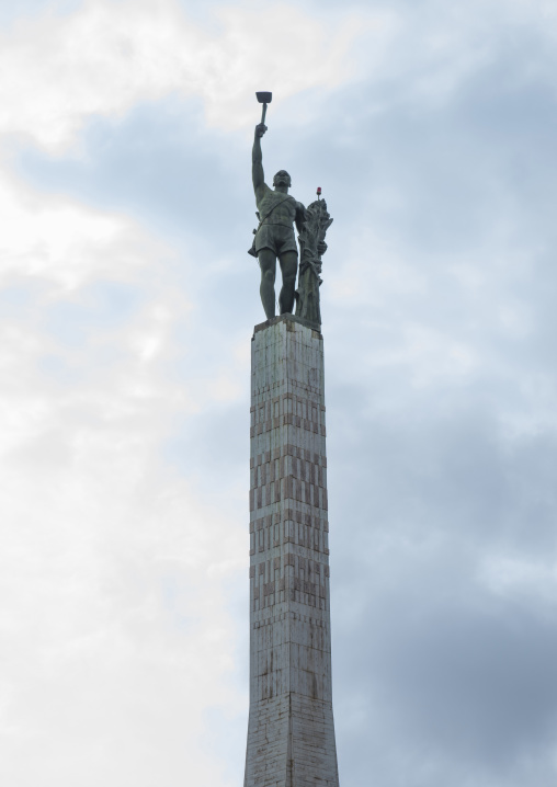Benin, West Africa, Cotonou, red star square column and statue