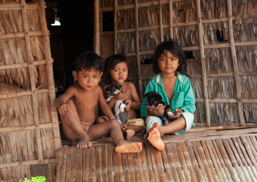 Cambodian children in the floating village on Tonle Sap lake, Siem Reap Province, Chong Kneas, Cambodia