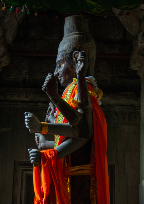 Statue of Vishnu the hindu god of protection inside the towers of Angkor wat, Siem Reap Province, Angkor, Cambodia