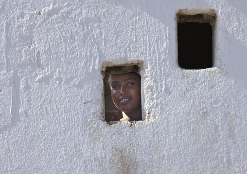 Woman Looking Thru A Little Window, Obock, Djibouti
