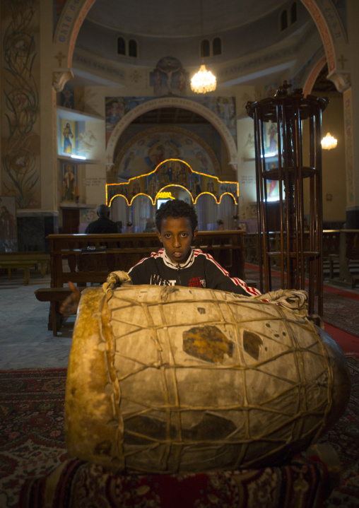 Boy Playing Drums In A Church, Central region, Asmara, Eritrea