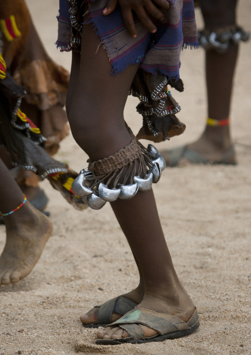 Hamer Tribe Women With Bells Around Their Calf Dancing During Bull Leaping Ceremony, Omo Valley, Ethiopia