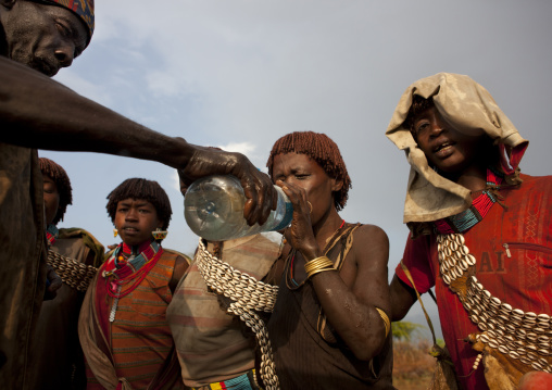 Woman Bana Drinks From Plastic Bottle Ethiopia