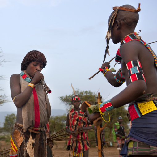 Bana Woman Blowing A Horn While Getting Flogged Bull Jumping Ceremony Omo Valley Ethiopia