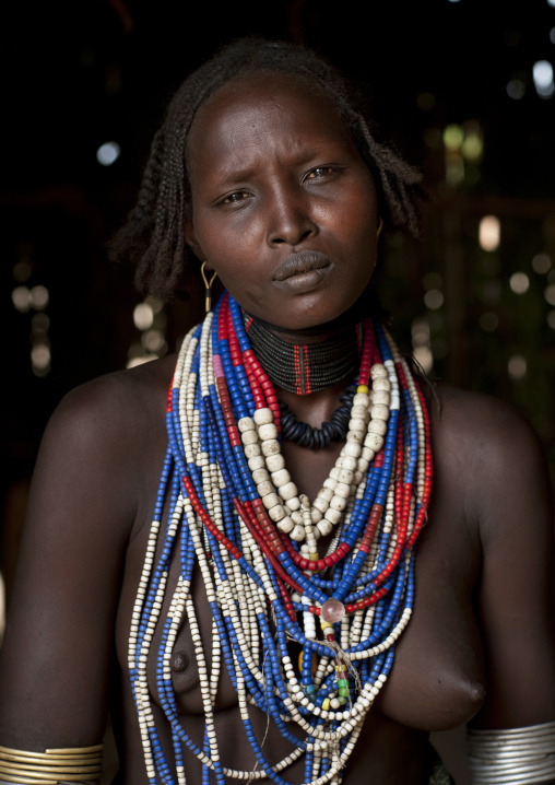 Portrait Of Beautiful Erbore Tribe Woman Wearing Beaded Necklace,  Omo Valley, Ethiopia
