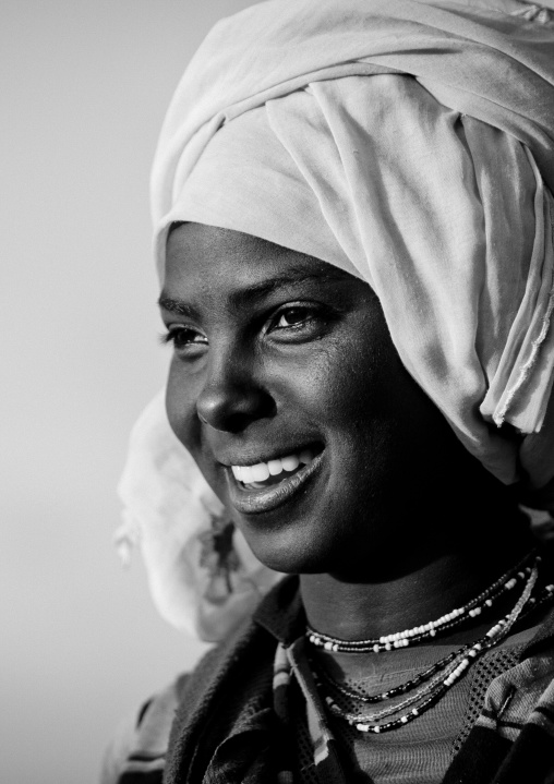 Black And White Portrait Of An Oromo Woman With Toothy Smile, Dire Dawa, Ethiopia