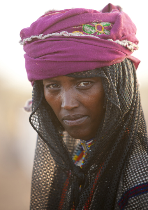 Portrait Of A Karrayyu Tribe Woman With Colourful Necklaces And Black Headscarf During Gadaaa Ceremony, Metahara, Ethiopia