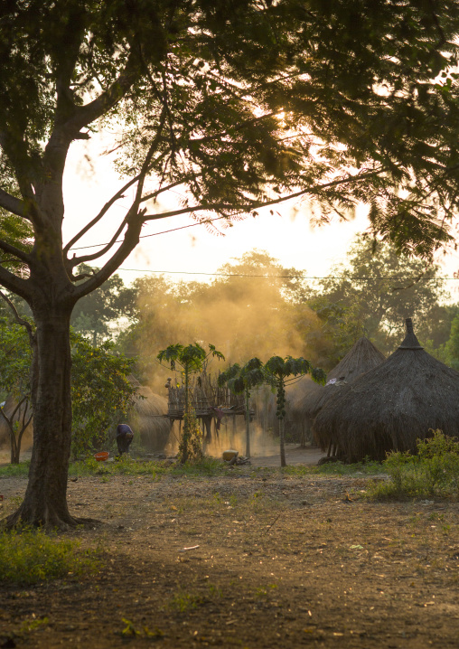 Anuak Tribe Woman Cleaning The Ground In Abobo, The Former Anuak King Village, Gambela Region, Ethiopia