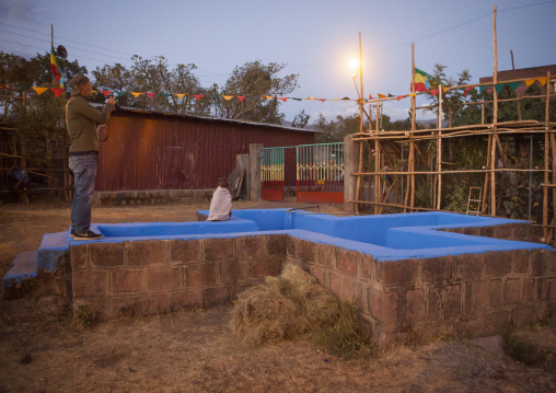 Orthodox Pilgrim In Front Of The Pool At Timkat Festival, Lalibela, Ethiopia
