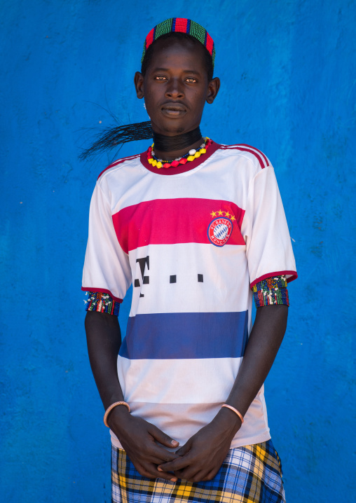 Portrait of a hamer tribe man with bayern munich football shirt, Omo valley, Turmi, Ethiopia