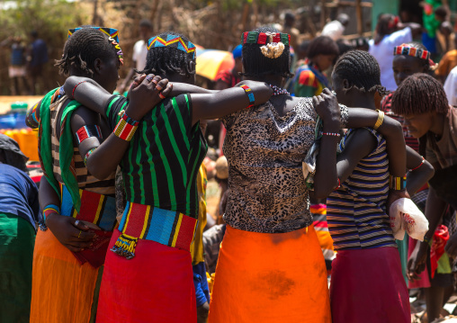 Rear view of a group of bana tribe women in a market, Omo valley, Key afer, Ethiopia