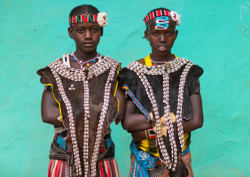 Tsemay tribe girls with traditional goat skin clothes, Omo valley, Key afer, Ethiopia