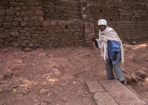 Lonely ethiopian monk during kidane mehret orthodox celebration, Amhara region, Lalibela, Ethiopia