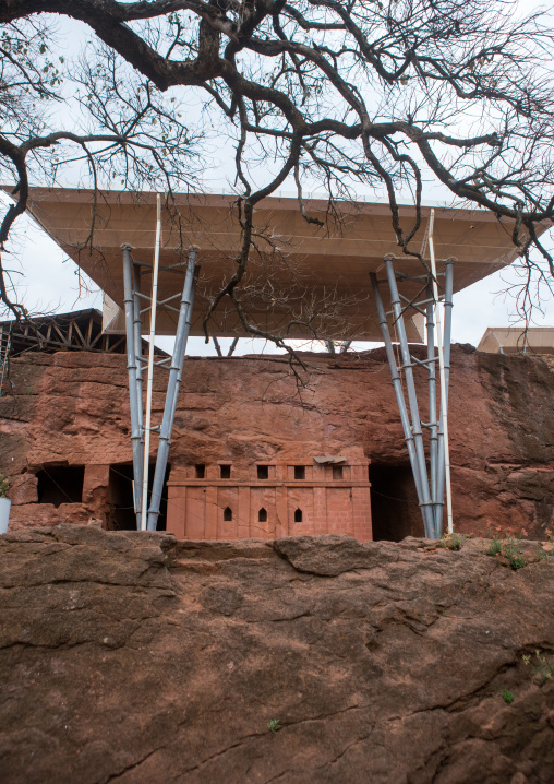 Protective shelters over bete aba libanos monolithic rock-cut church, Amhara region, Lalibela, Ethiopia