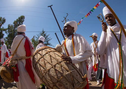 Ethiopian orthodox priests with drums celebrating the colorful Timkat epiphany festival, Amhara region, Lalibela, Ethiopia
